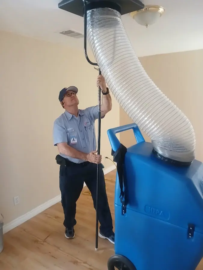 Mini Split Installation technician using HEPA equipment in Saline